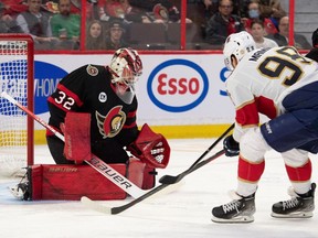 Ottawa Senators goalie Filip Gustavsson (32) makes a save on a shot from Florida Panthers centre Maxim Mamin (98) in the first period at the Canadian Tire Centre, April 28, 2022.