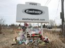File photo: A memorial display to the victims of the explosion and fire at Eastway Tank near the entrance to the company property on Merivale Road.