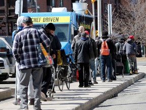 Hundreds of people lined up at the Ottawa Mission on Monday to get an Easter meal.