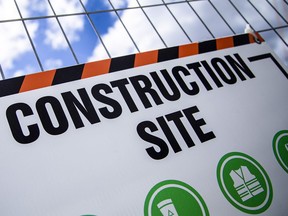 FILE PHOTO: Construction site safety signs.