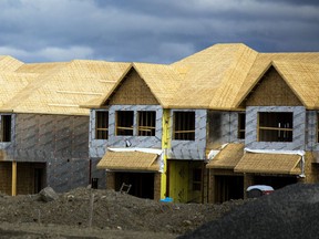 A view of new home build construction site in Ottawa's west end, in the Stittsville area, on Sunday, April 17, 2022.