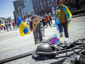 Several communities came together to stand in solidarity with the people of Ukraine on Sunday, May 8, 2022, at the Canadian Tribute to Human Rights on Elgin Street.  The group then marched to the National War Memorial to lay flowers at the Tomb of the Unknown Soldier.  ASHLEY FRASER, POSTMEDIA
