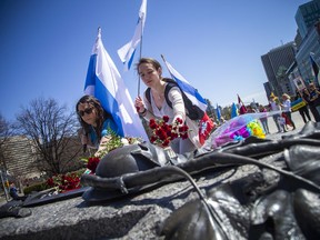 Several communities came together to stand in solidarity with the people of Ukraine on Sunday, May 8, 2022, at the Canadian Tribute to Human Rights on Elgin Street.  The group then marched to the National War Memorial to lay flowers at the Tomb of the Unknown Soldier.