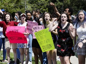 Students from Béatrice-Desloges Catholic High School protest the implementation of a dress code