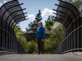 Kathy Vandergrift, president of the Queensway Terrace North Community Association, is unhappy that the pedestrian bridge crossing the Transitway is being closed down even though the new one is not yet ready to be opened.