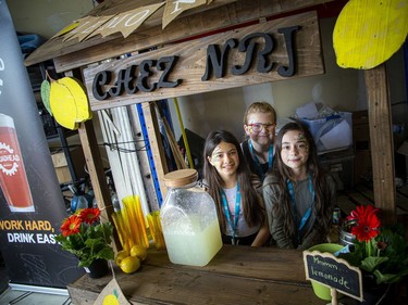 From left 10-year-old Gabby Griffin, 10-year-old Charlotte Harrison, and 10-year-old Leightyn Dill who will be celebrating her 11th birthday Tuesday, were racking up the sales of cold lemonade to the shoppers coming in.