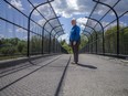 Kathy Vandergrift, president of the Queensway Terrace North Community Association, is among those unhappy with the early closing of the pedestrian bridge crossing the Transitway.