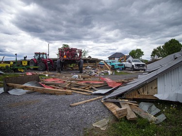 James Campbell, owner of Campbell Farms in White Lake, lost the barn that was built in 1909 and survived five generations, during Saturday's devastating storm that ripped through the region.