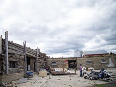 James Campbell, owner of Campbell Farms in White Lake, lost the barn that was built in 1909 and survived five generations, during Saturday's devastating storm that ripped through the region.