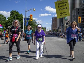 Rejeanne Fairhead strides purposefully towards a Canadian-record time for the 95- to 99-year-old age category in the five-kilometre race on Saturday.