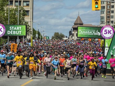 OTTAWA --  A group of runners start their 5K race at Tamarack Ottawa Race Weekend, Saturday, May 28, 2022.