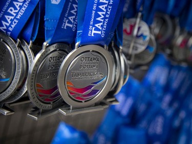 OTTAWA --  1/2 marathon medals hang at the finish line at Tamarack Ottawa Race Weekend, Sunday, May 29, 2022.