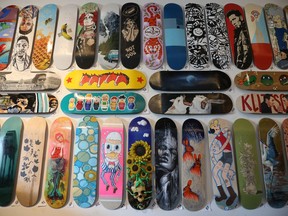 A selection of skateboard decks that will be auctioned at Beyond The Pale Brewing Company until May 29th.