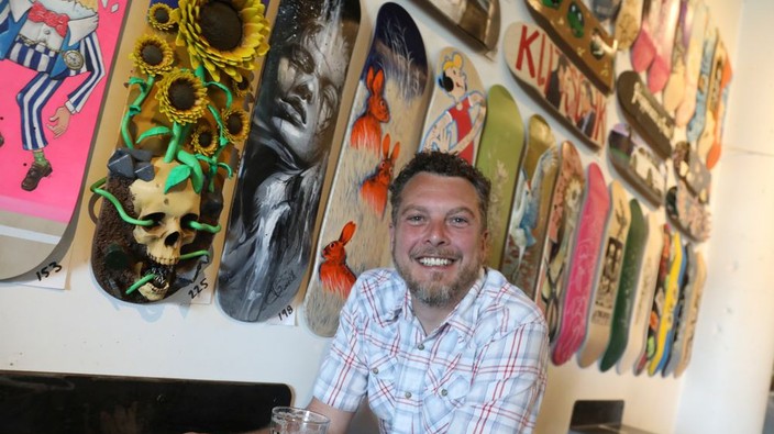 Skateboard deck art exhibit doubles as a fundraiser for Ukraine