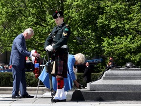 The Duchess of Cornwall and Prince of Wales dedicated garlands and flowers to the National War Memorial in Ottawa on May 18, 2022.