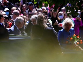 The Duchess of Cornwall and Prince of Wales will leave after attending the National War Memorial ceremony in Ottawa on May 18, 2022.