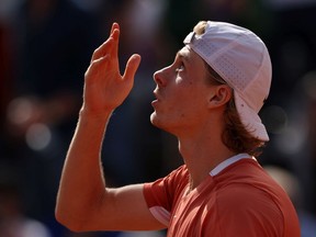 Denis Shapovalov of Canada celebrates winning match point against Lorenzo Sonego of Italy during their singles first round match in the Internazionali BNL D'Italia at Foro Italico on May 09, 2022 in Rome, Italy.