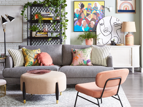 This room features a light pink ottoman, a pink padded dining chair and pink tassel pillow.