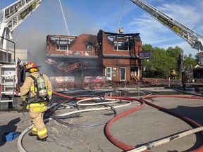 Ottawa firefighters provided assistance at a four-alarm fire in Gatineau Friday.