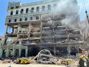 Debris is scattered after an explosion destroyed the Hotel Saratoga, in Havana, Cuba May 6, 2022.