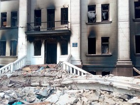 General view of the remains of the drama theatre, which was hit by a bomb when hundreds of people were sheltering inside in Mariupol, Ukraine, in this handout picture released March 18, 2022.