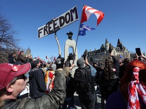 Demonstrators gather at the National War Memorial during the 'Rolling Thunder' protests on April 30, 2022 in Ottawa.