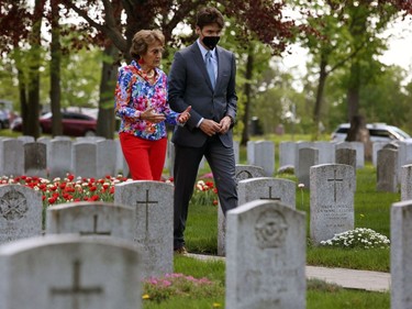 Prime Minister Justin Trudeau and Princess Margriet of the Netherlands walks during a visit at the Canadian National Military Cemetery May 13, 2022 in Ottawa, Princess Margriet is on a five day visits to Canada.