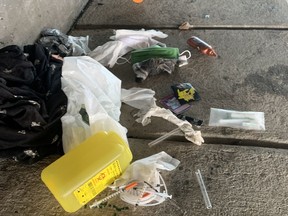 Residents around Tom Brown Arena say the onset of spring has seen an increase in debris and needles near the temporary homeless shelter. This submitted photo shows the scene near the Bayview LRT station.