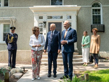 Her Royal Highness, Princess Margriet of the Netherlands, poses alongside her husband, Professor Pieter van Vollenhoven, and the NCC's CEO Tobi Nussbaum at Stornoway for a ceremonial planting of tulips. They were accompanied by the Ambassador of the Kingdom of the Netherlands, Ines Coppoolse.