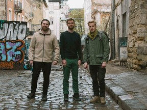 From left, Dr. Stanislav Polozov, founder Rostislav Filippenko, and Charles McBryde of Mission Kharkiv, which distributes medical supplies in Ukraine.