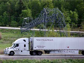 Major hydro lines were down along Highway 417 at Hunt Club on May 22, 2022, following a destructive storm.