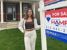 About 40 per cent of the properties sold so far this year by Chelsea Hamre, sales representative with the Hamre Real Estate Team, involved purchases by out-of-towners. Photo credit: Leif Olson.