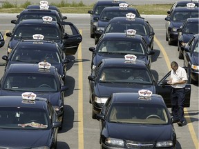 FILE PHOTO: Taxi cabs at the Ottawa Airport.
