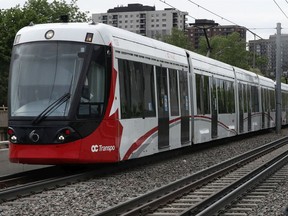 An LRT car rolls along the Confederation Line near the University of Ottawa on Friday afternoon.