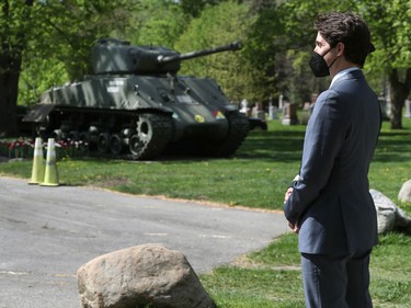 Prime Minister Justin Trudeau waits for Royal Highness Princess Margriet of the Netherlands to arrive at the Beechwood Cemetery.