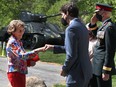 Her Royal Highness Princess Margriet of the Netherlands greets Canadian Prime Minister Justin Trudeau on May 13, 2022, ahead of a ceremony at Beechwood Cemetery to unveil a plaque dedicated to Gen. Charles Foulkes.