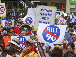 People gather at Dawson College for a rally to oppose Bill 96 in Montreal on Saturday, May 14, 2022.