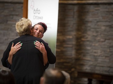 Micheline Lepage, board member with BFO gave Boileau a great big hug after her very touching speech.