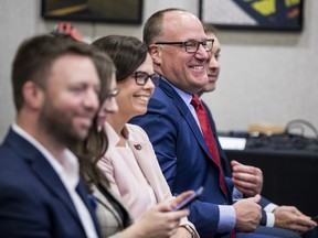 Anthony LeBlanc, Ottawa Senators' president of business operations, and Erin Crowe CFO, smile during the announcement that the team has won preferred bidders status for an sports development at LeBreton Flats.
