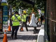 File: Crews setting up concrete barriers along Wellington Street, near the Supreme Court.