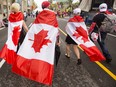 Back in 2017, people sporting the Canadian flag on July 1, as these folks did, were just there for the big birthday party.