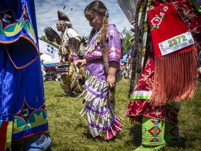 A girl participates in the Indigenous Experiences Summer Solstice Competition Pow Wow at Madahòkì Farm on June 26. We're building a future Canada for her — and for everyone.