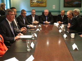 Jim Watson, far left, met with Alstom and RTG executives in 2019. Alstom CEO Henri Poupart-Lafarge is far right.