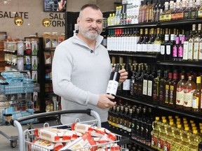 Tony Zacconi of the Zacconi family stands in the grocery section of the hall at Sala San Marco, Little Italy. The family went back into the grocery business after COVID restrictions cut into the banquet-hall operation.