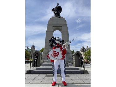 A protestor in front of the Tomb of the Unknown Soldier at the National War Memorial on Thursday, Jun. 30, 2022.