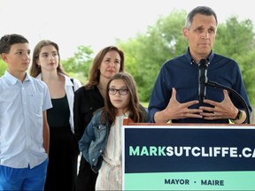 Along with his wife Ginny and three kids (Erica Jack and Kate), Mark Sutcliffe announced his candidacy for mayor Wednesday at a park in Kanata.