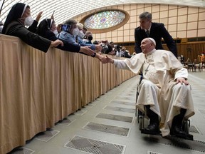 Pope Francis meets pilgrims at an audience in the Paul VI hall at the Vatican on May 5, 2022.
