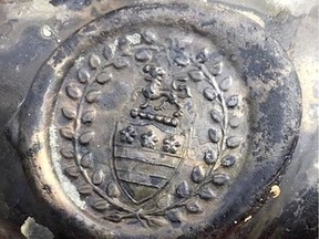 A glass seal with the crest of the Legge family, ancestors of the first U.S. President George Washington, recovered from the shipwreck of The Gloucester, which sank 340 years ago while carrying King of England, James Stuart, is pictured after the royal warship discovered off the coast of Norfolk, Britain June 10, 2022.
