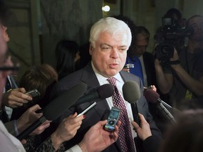 New Democratic Party MPP Peter Tabuns answers questions from the media in Toronto on Thursday, February 21, 2013. Ontario's NDP has named longtime Toronto caucus member Peter Tabuns as its interim leader.