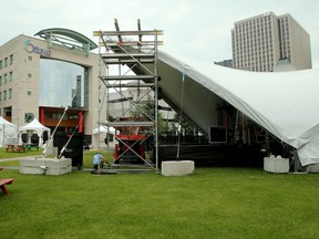 A Jazzfest stage gets set up at Marion Dewer Plaza in front of Ottawa City Hall on Wednesday.